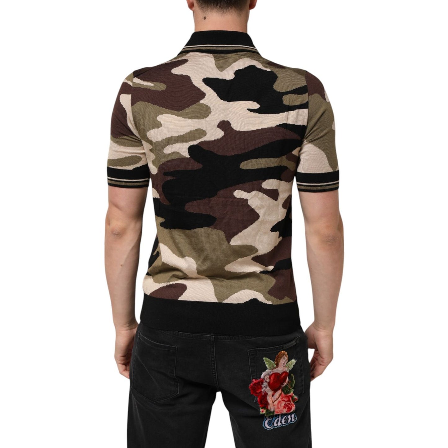 Back view of model wearing Dolce & Gabbana Camouflage Brown Silk MilitaryPolo T-shirt in 100% silk with camouflage print, made in Italy.