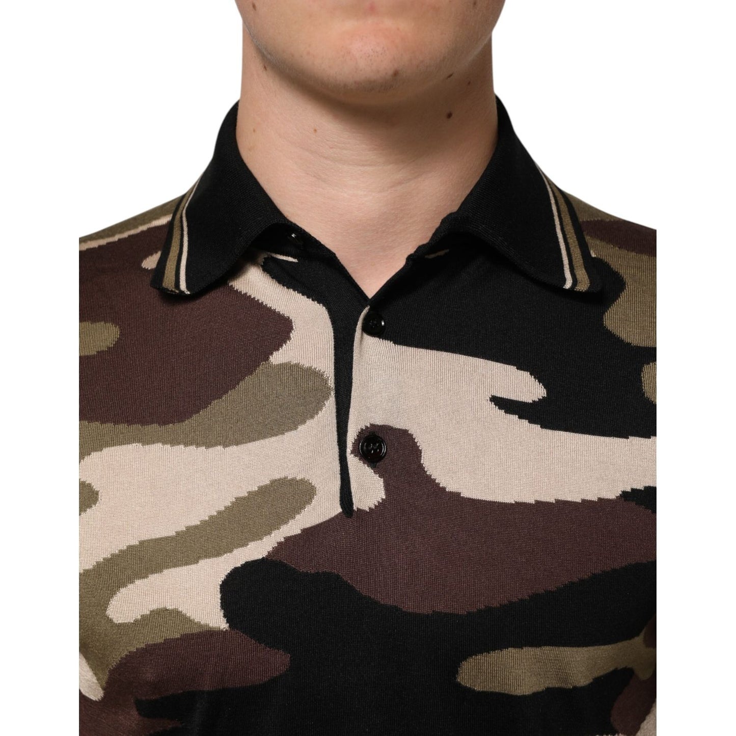 Dolce & Gabbana Camouflage Brown Silk MilitaryPolo T-shirt close-up showing camouflage pattern and luxury silk fabric.