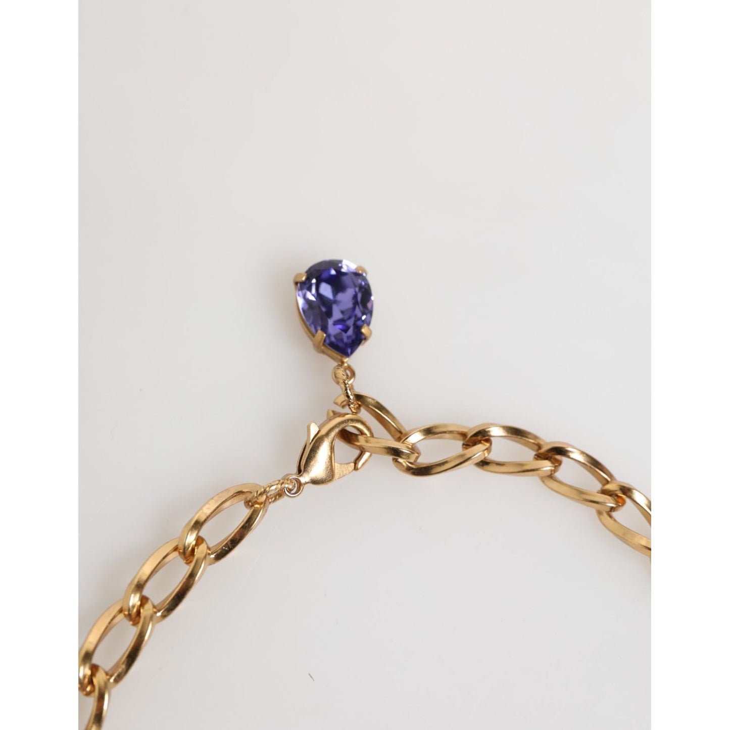 Dolce & Gabbana Gold Brass Crystal Pearl Purple Floral Pendant Jewelry Necklace with violet crystal charm on chain.