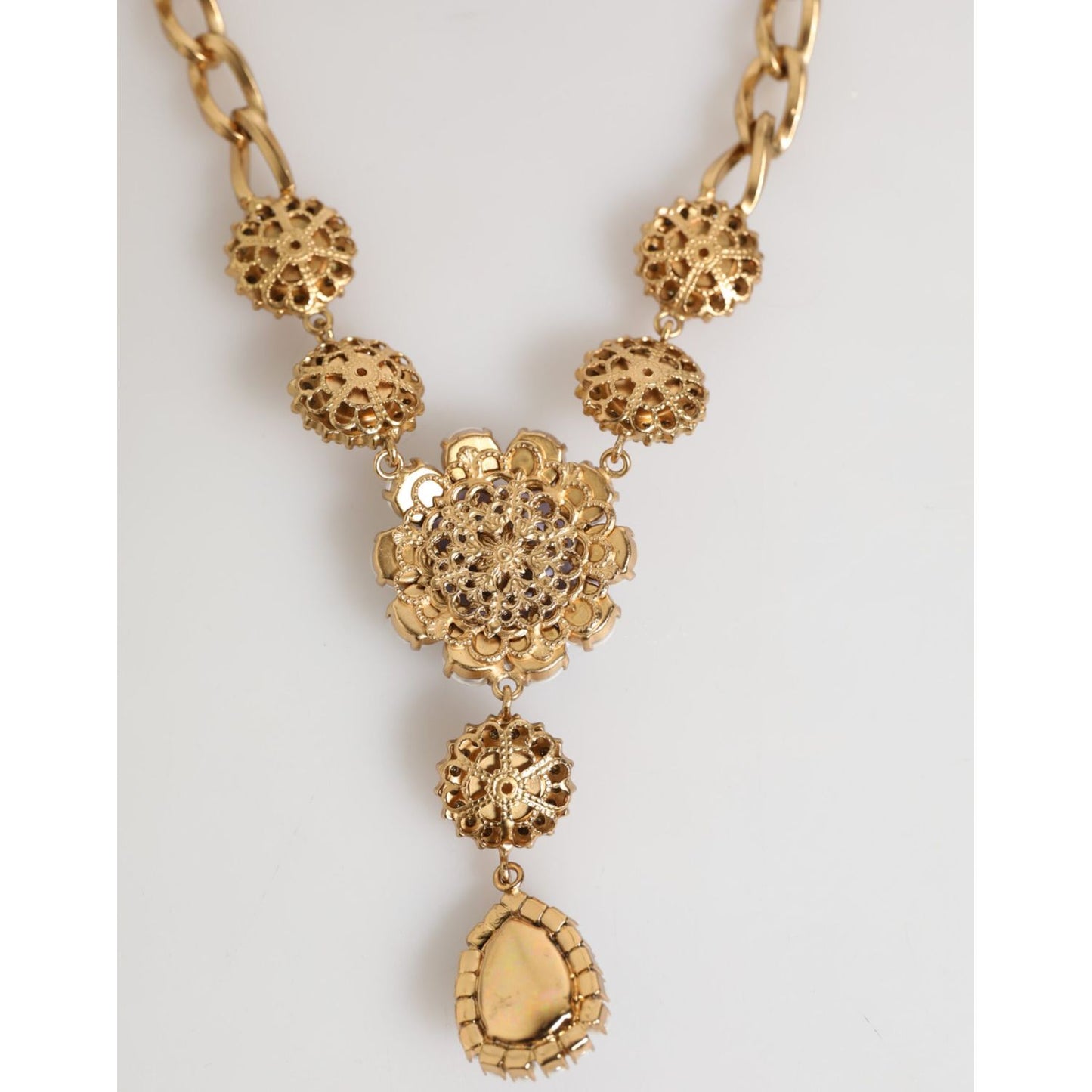 Dolce & Gabbana Gold Brass Crystal Pearl Purple Floral Pendant Jewelry Necklace with intricate gold detailing