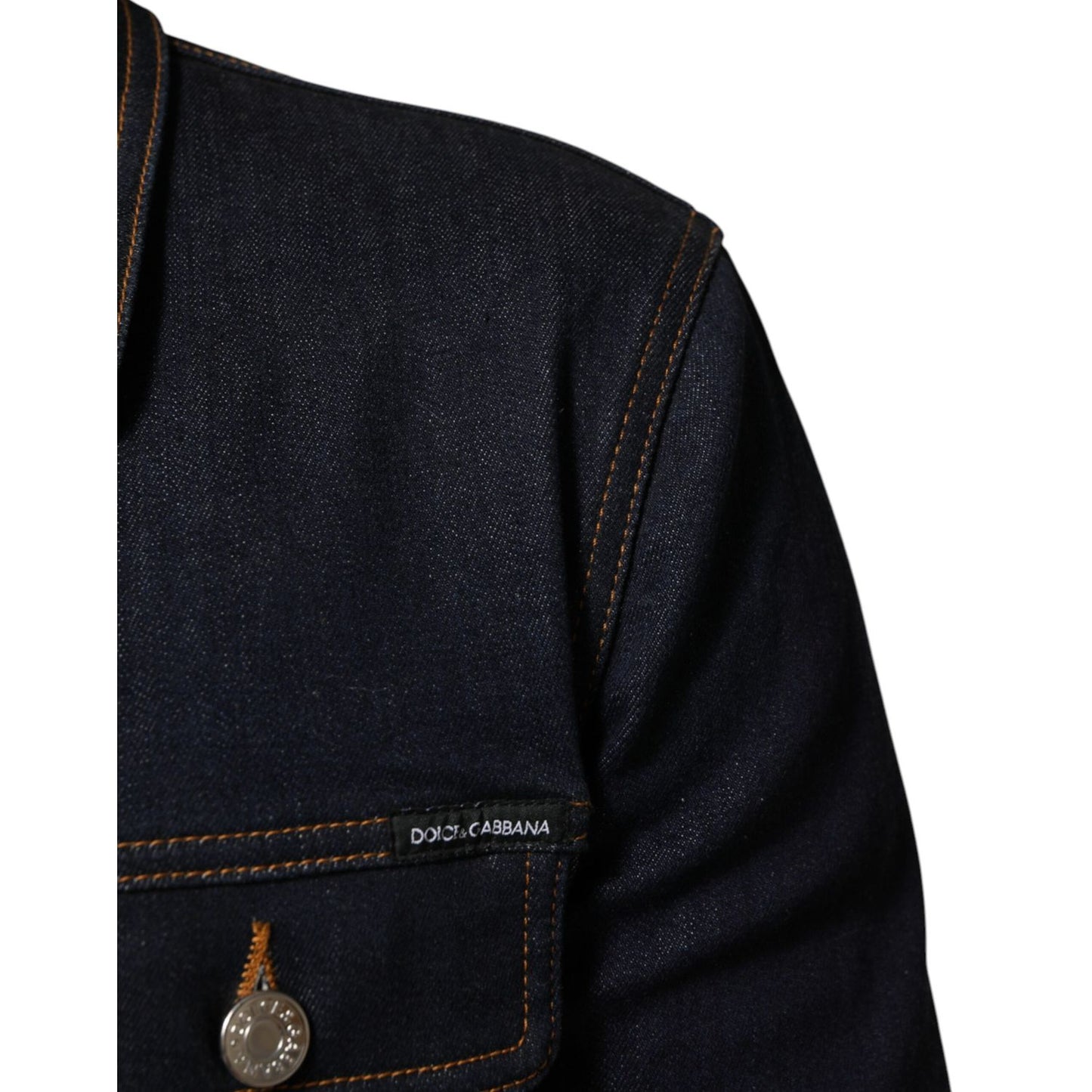 Dolce & Gabbana Indigo Blue Denim Slim Fit Logo Patch Jacket with contrast stitching and silver-tone logo buttons.