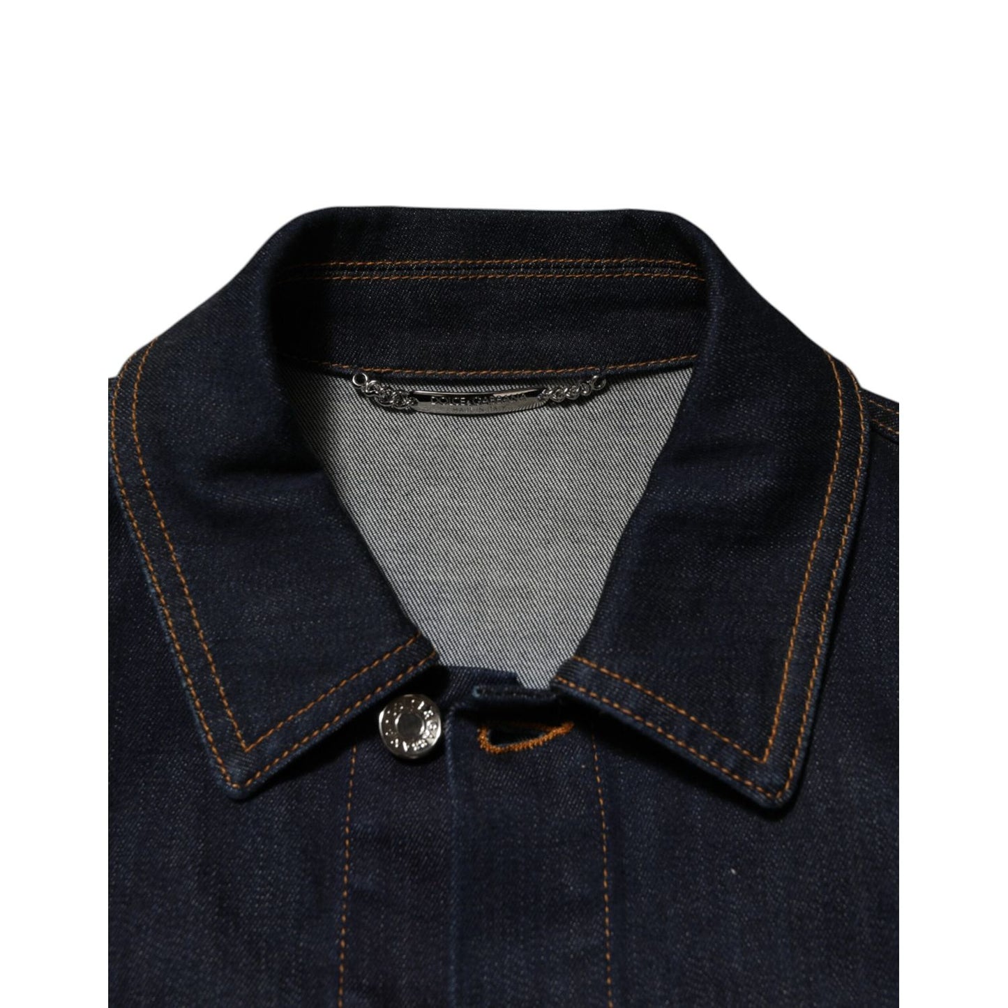 Close-up of Dolce & Gabbana Indigo Blue Denim Slim Fit Logo Patch Jacket collar with contrast stitching and logo buttons.