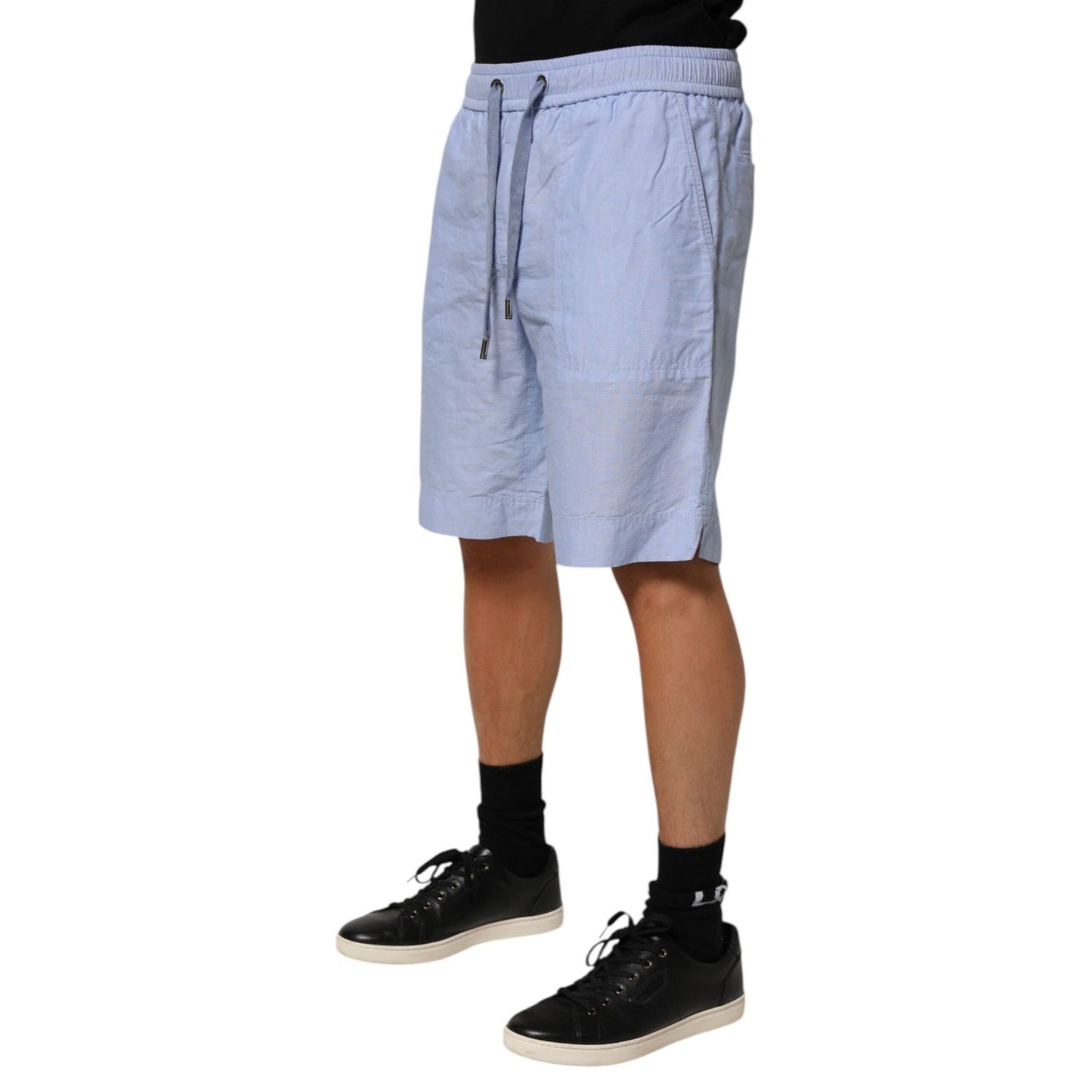 Dolce & Gabbana Light Blue Linen Mid Waist Men Bermuda Shorts, stylish summer wear, casual fit, breathable fabric for warm weather