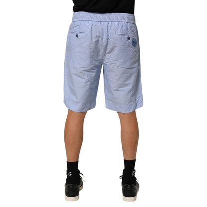Rear view of Dolce & Gabbana Light Blue Linen Mid Waist Men Bermuda Shorts worn by model