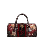 Dolce & Gabbana Multicolor Leather Jacquard Velvet Travel Duffle Bag with floral design and logo engraved hardware.