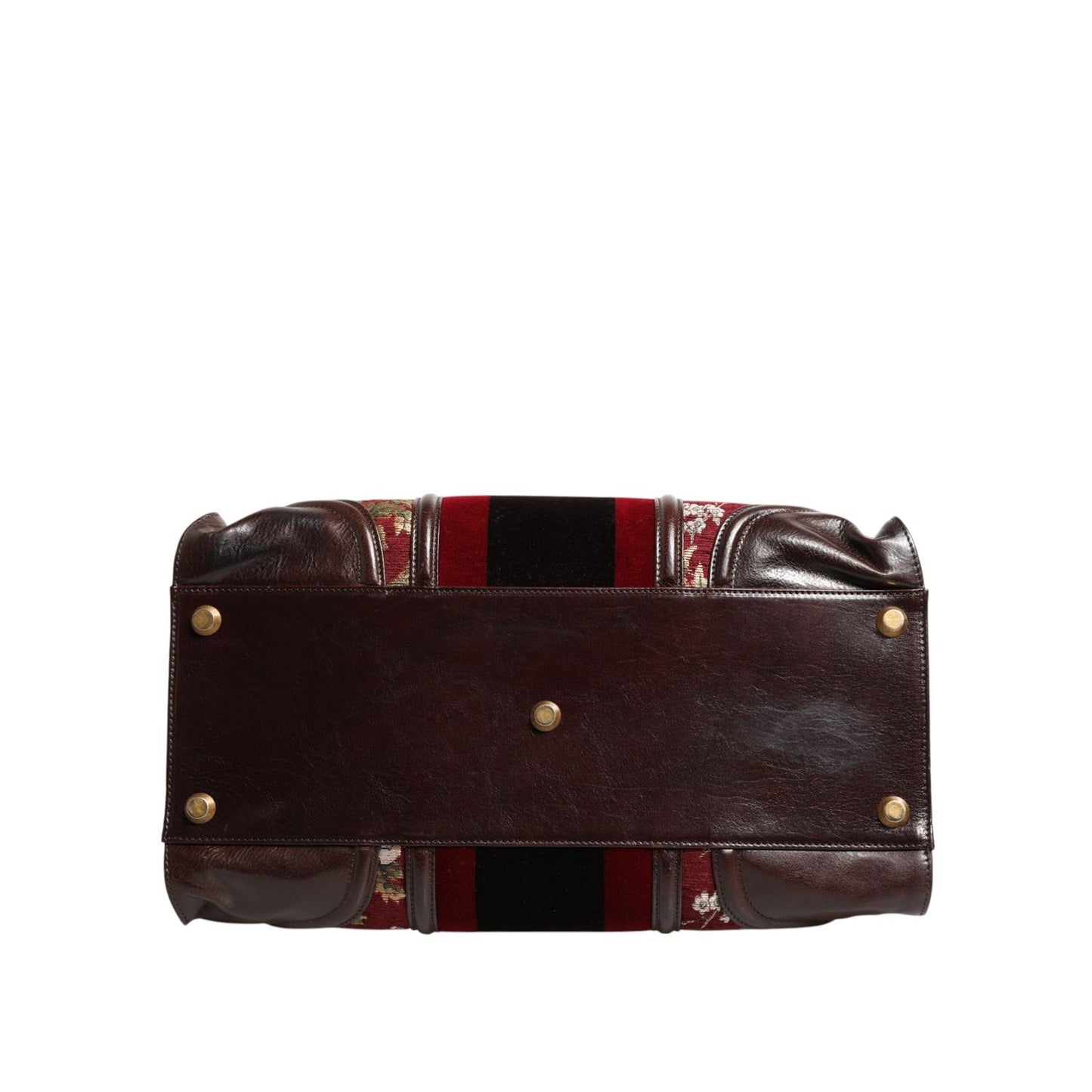 Bottom view of Dolce & Gabbana Multicolor Leather Jacquard Velvet Travel Duffle Bag with metal hardware details.