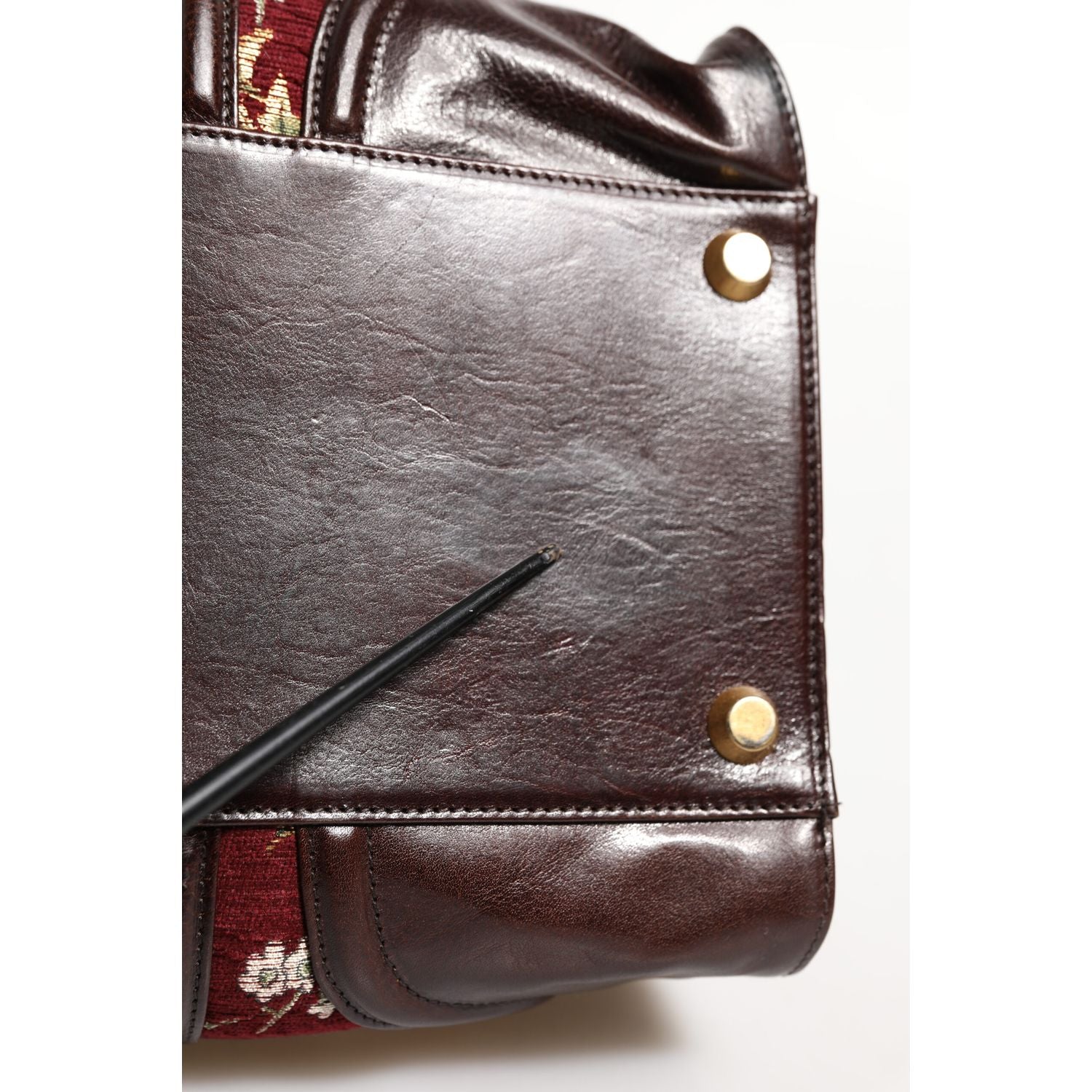 Front view with bag zipped and handles upright.