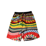 Dolce & Gabbana Multicolor Sicilian Carretto Shorts Swimwear featuring vibrant Sicilian Carretto print, perfect for beach or resort wear.