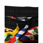 Close-up of Dolce & Gabbana Multicolor Sicilian Carretto Shorts Swimwear with vibrant silk print and drawstring detail.