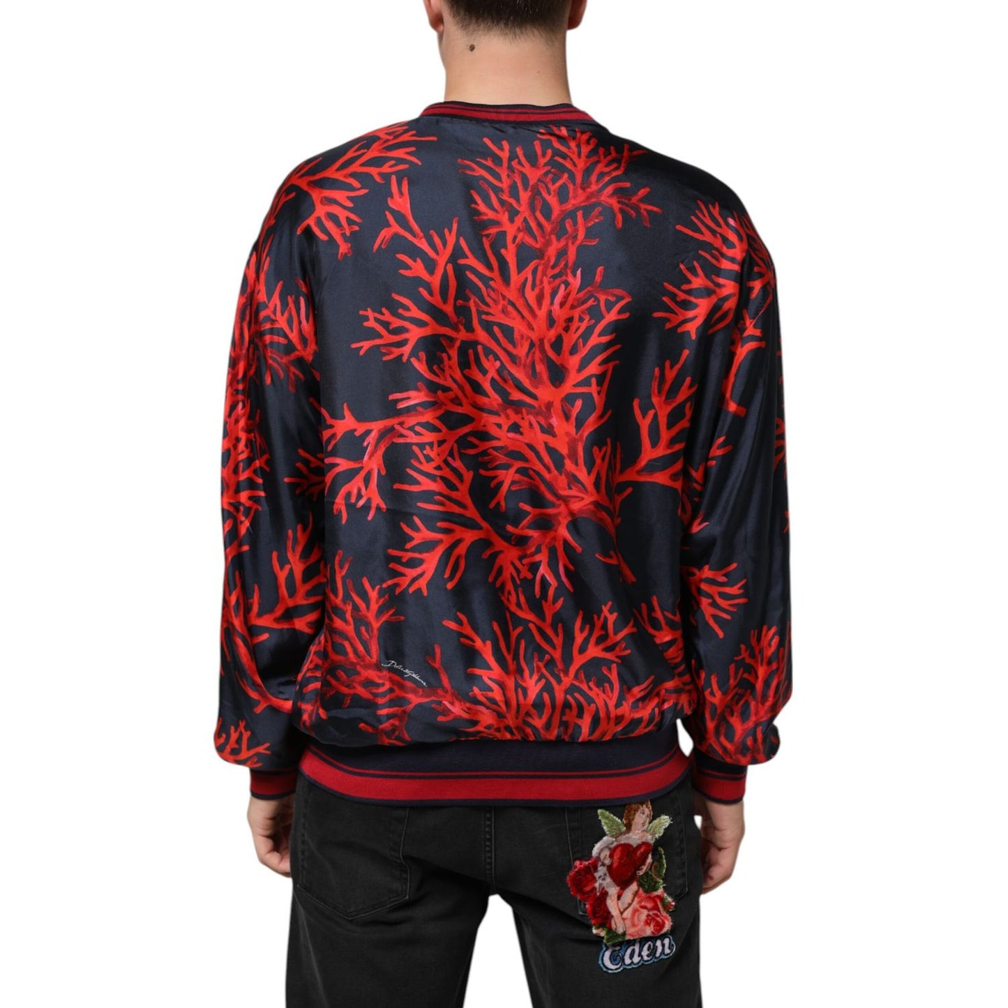 Dolce & Gabbana Silk Navy Red Coral Print Pullover Sweater showcasing vibrant coral design on model.