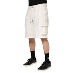 Dolce & Gabbana White Cotton Cargo Bermuda Sweatshorts Shorts with drawstring waist and cargo pockets, worn by male model.