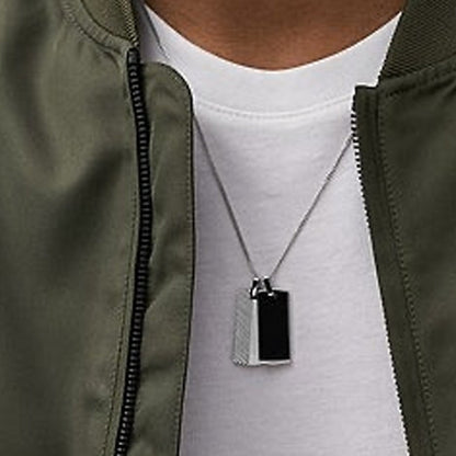 Stylish pendant necklace featuring the FOSSIL JEWELS JEWELRY Mod. JF04565040 worn by a person in a casual jacket.