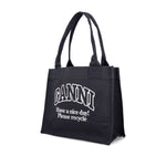 Ganni Organic cotton large tote bag in black with "Have a nice day! Please recycle" text, made from at least 50% organic materials.