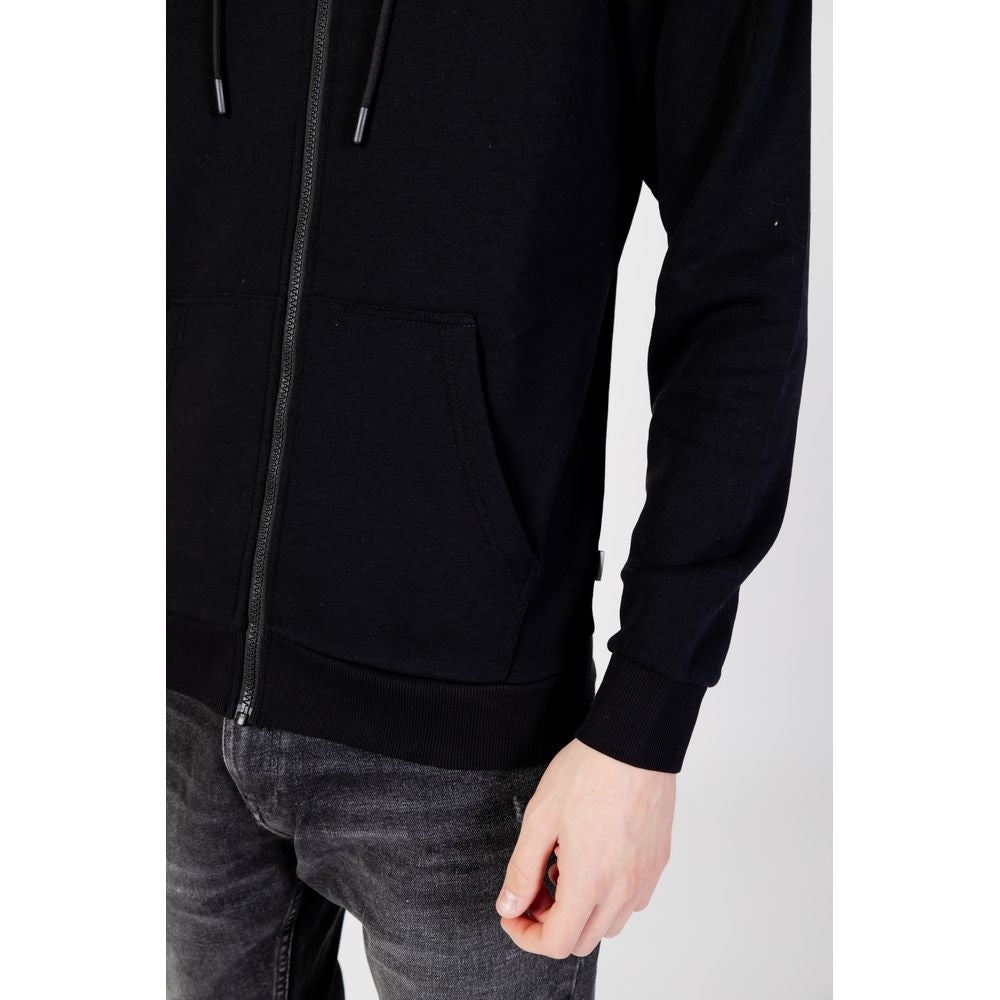 Model wearing Jack Jones Black Polyester Hoodie with full zip and adjustable drawstring hood for casual style.