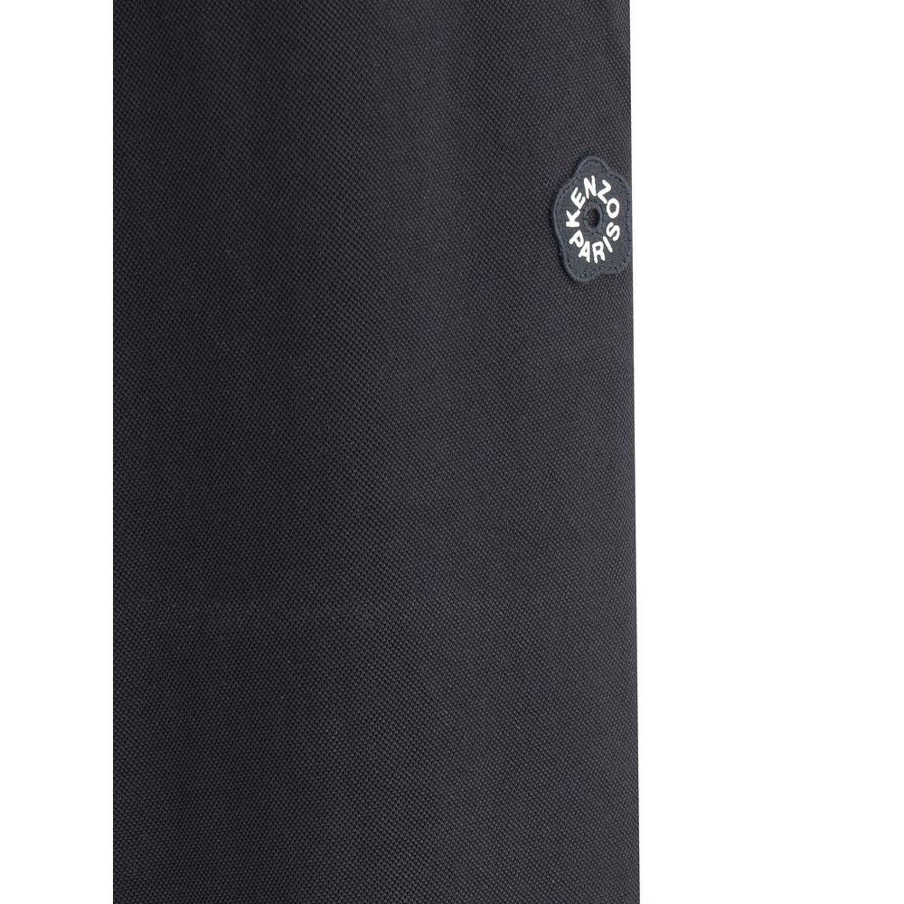 Close-up of Kenzo Black Polyester Joggers (Workout Pants) showcasing the iconic logo flower.