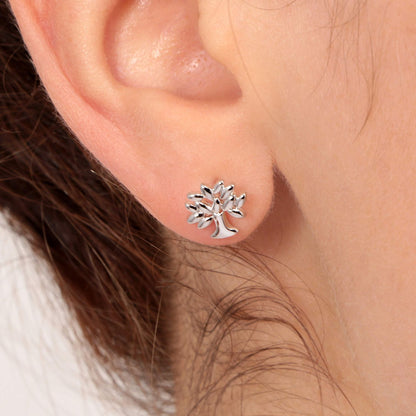 Close-up of ear wearing LA PETITE STORY JEWELRY Mod. LPS02ARQ09 tree-shaped earring