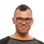 Longines Black Unisex Glasses Frame worn by model, round full-rim plastic spectacles, demo lenses, black frame, size 52-17-145