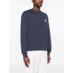 Alt Tag: Maison Kitsuné Maison Kitsune fox-motif cotton sweatshirt in navy blue with ribbed cuffs and hem, worn by model.