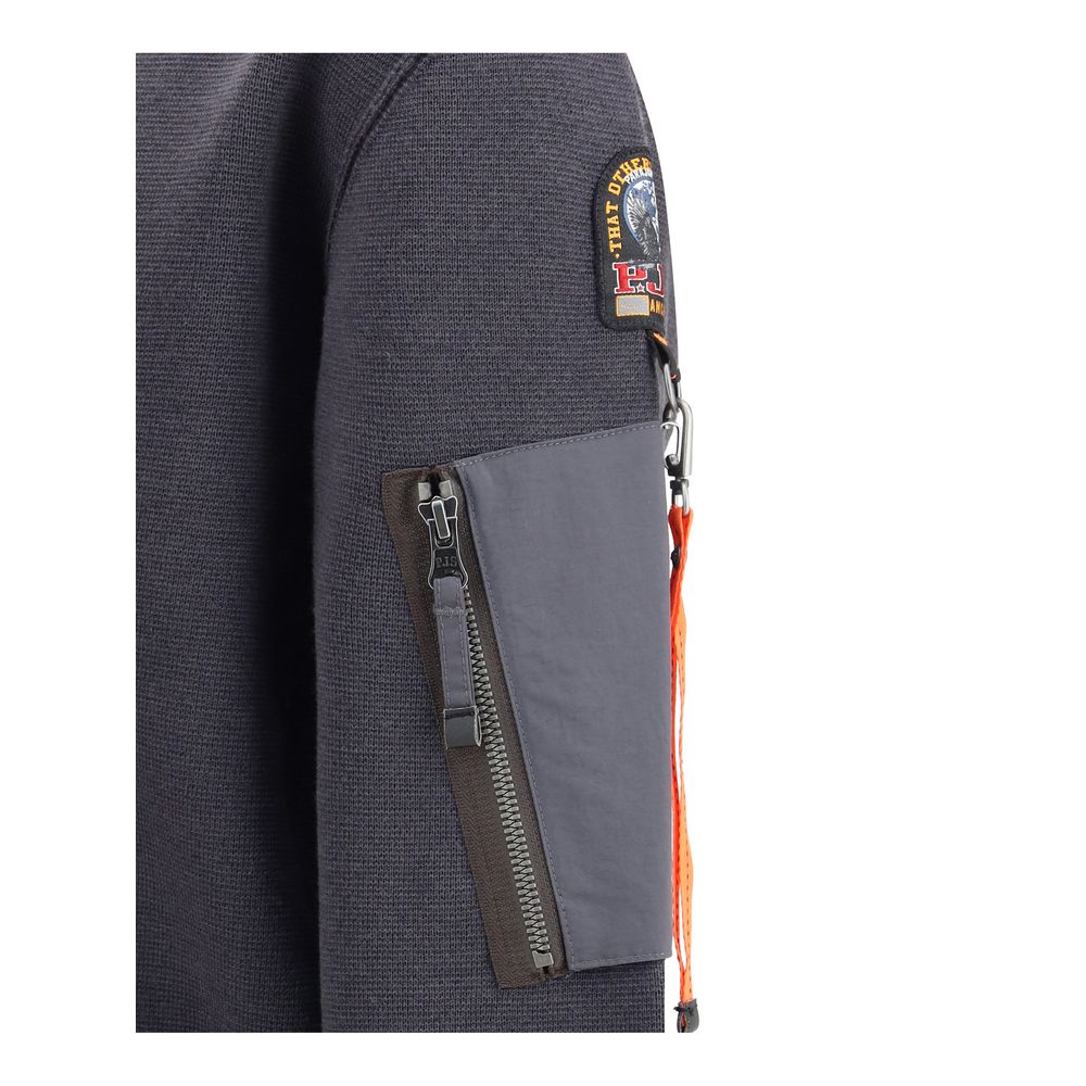 Front view with bag zipped and handles upright.
