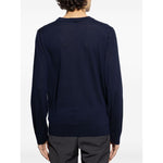 Rear view of navy blue Paul Smith Sweaters Blue, wool crewneck sweater with long sleeves and ribbed trim.