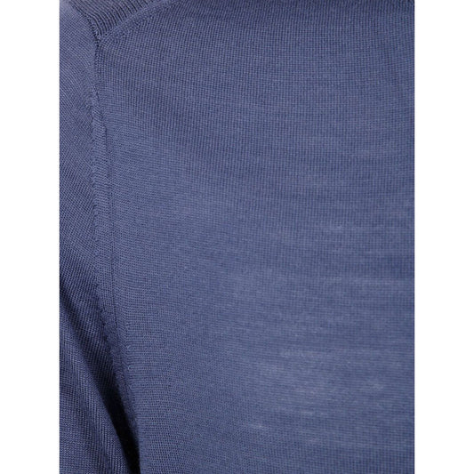 Paul Smith Sweaters Clear Blue merino wool close-up showing petrol blue knit texture with ribbed detailing.