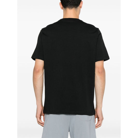 Back view of model wearing Paul Smith T-shirts and Polos Black, black crew neck short sleeve cotton t-shirt, size M.