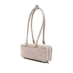 Self-Portrait suede baguette shoulder bag in grey with silver-tone hardware, featuring a bow detail and two top handles.