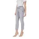 Woman wearing Street One Gray Cotton Slim Fit Jean with heels, showcasing a stylish slim fit design in light gray color.