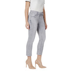 Woman wearing Street One Gray Cotton Slim Fit Jean with high heels, showcasing the jeans' silhouette and fit.