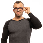 Man wearing Tod's Chic Blue Rectangular Men's Eyewear, showcasing stylish and sophisticated blue frames for discerning gentlemen.