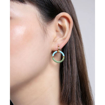 Close-up of lady wearing VICEROY JEWELS Mod. 13199E100-99 earrings with quartz analog movement, 10 ATM water resistance, in silver 925°.