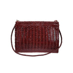 VIPERA Saba handbag in burgundy with woven pattern, zip closure, removable leather strap, single compartment, and internal pocket.