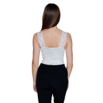 Back view of woman wearing Vero Moda White Viscose Tank Top for Spring/Summer collection, featuring lace straps and soft fabric.
