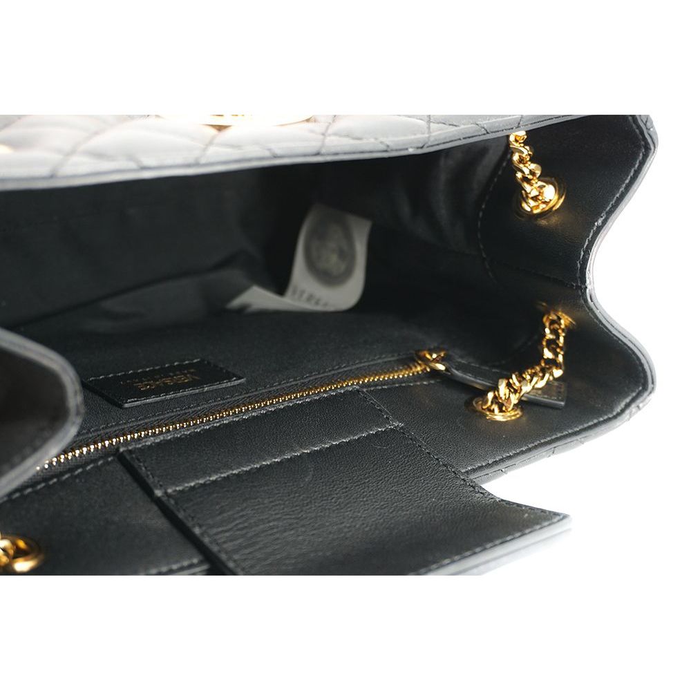 Front view with bag zipped and handles upright.