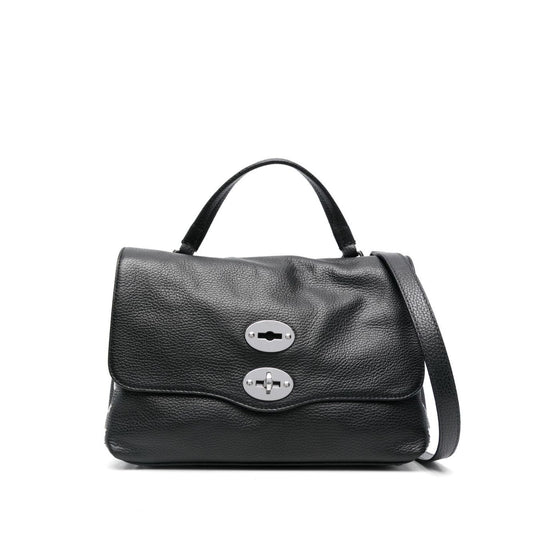 Zanellato Postina Daily medium leather handbag in black with grained texture, foldover top, and silver-tone detailing.